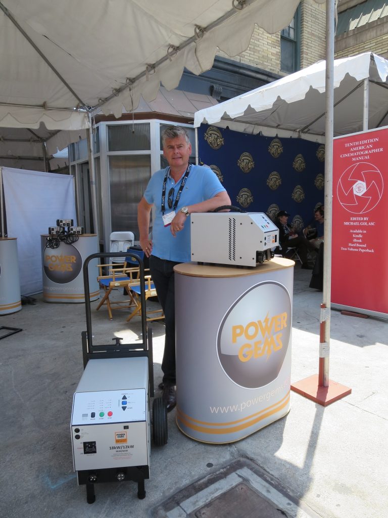 Pat McGuane of Power Gems settuing up the stand at Cine Gear Expo 2014