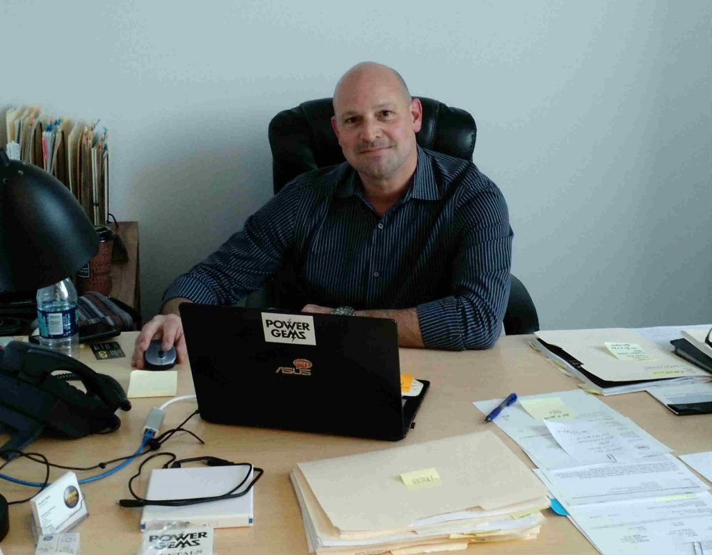 Dan Basso at his desk in the new Power Gems facility in Los Angeles