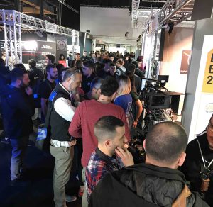 Visitors to MicroSalon Italia at Power Gems stand with ballasts on display