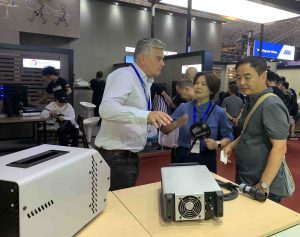 (L-R) Patrick McGuane of Power Gems with Pearl Guo of CFEC and Zhao Xiaoshi, Director of Photography at BIRTV 2019