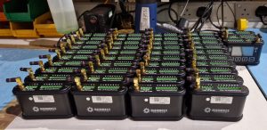 Rows of the new product from Power Gems, the GEM6 6-way handheld LED controller, lined up on the work surface at manufacturing facility in Manchester